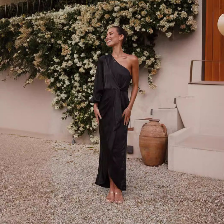Ladies wrap dress with asymmetric design and elegant waist belt Skovae
