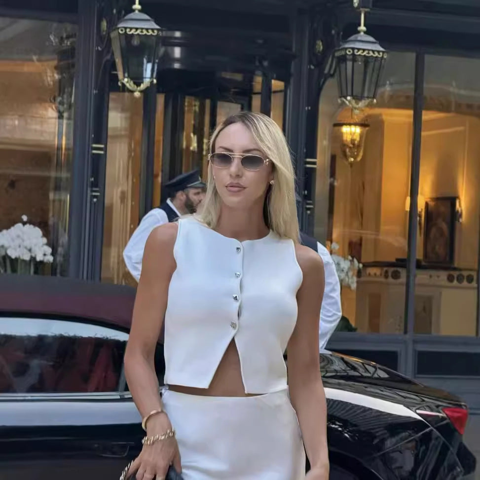 Dame ærmeløs top med elegante knapdetaljer og struktureret overflade Stilla
