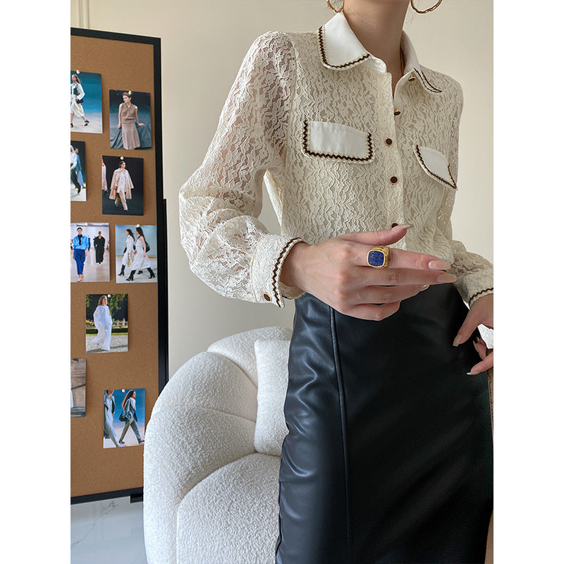 Kvindernes elegante bluse i blonder med kontrastdetaljer Stilla