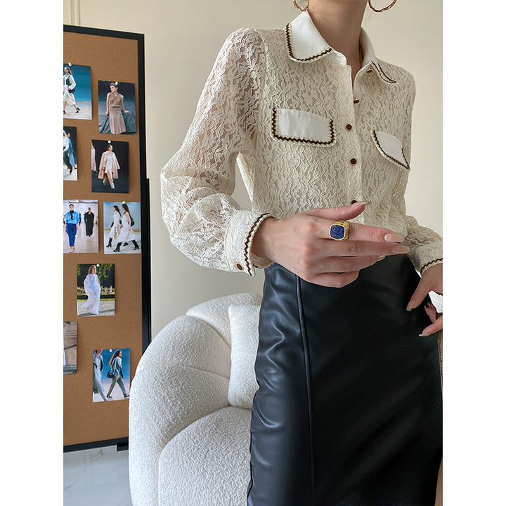Kvindernes elegante bluse i blonder med kontrastdetaljer Stilla