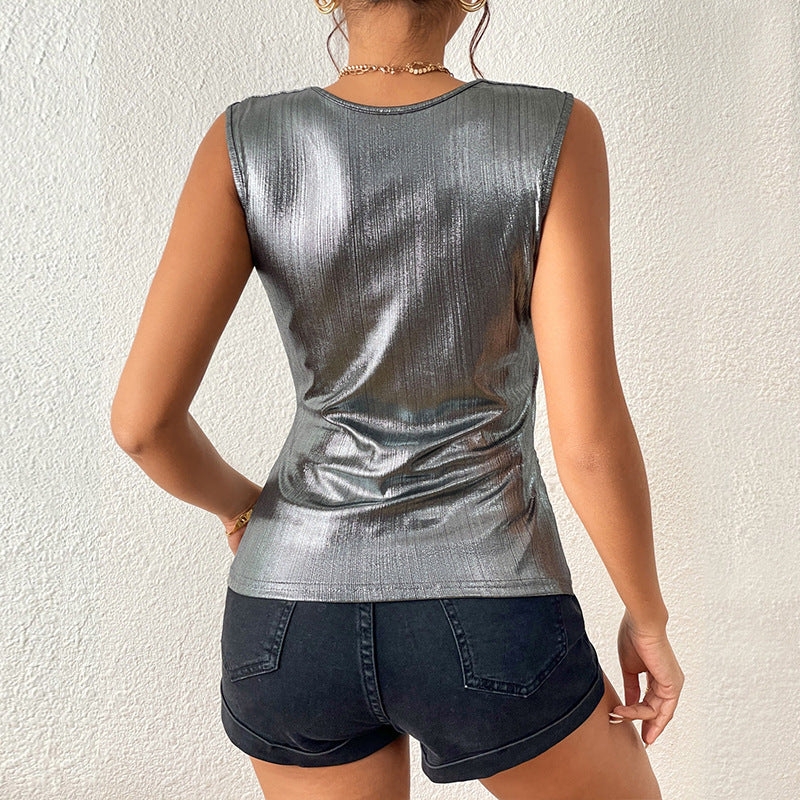 Dame figursyet top med omslagdesign og metallisk finish Stilla