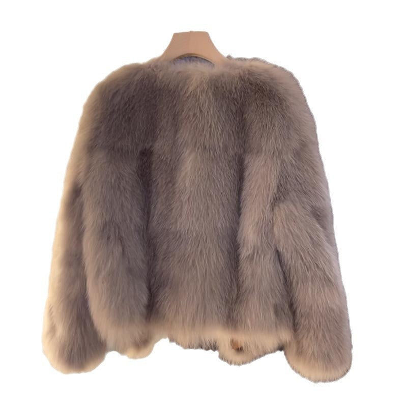 Damerne hyggelige faux fur jakke med elegant snit og dekorative spænder Stilla
