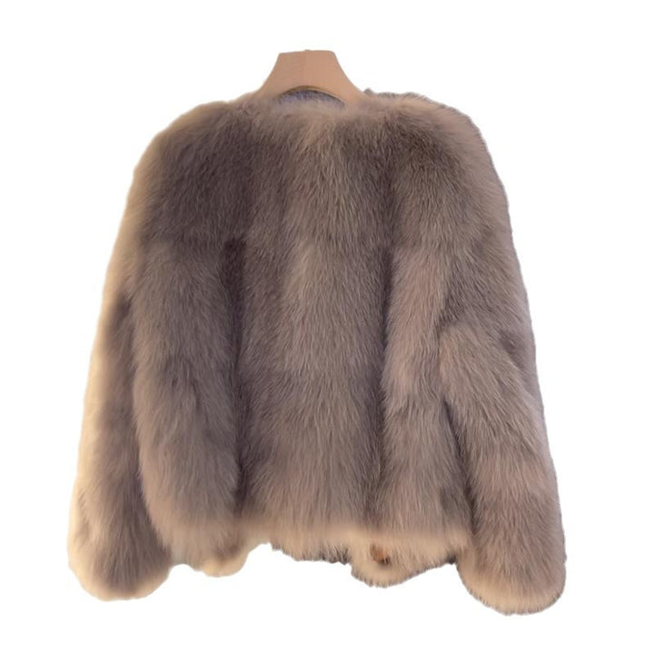 Damerne hyggelige faux fur jakke med elegant snit og dekorative spænder Stilla