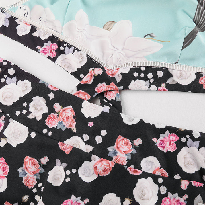 Dame to-delt outfit med blomstret top og bred maxi-nederdel Stilla