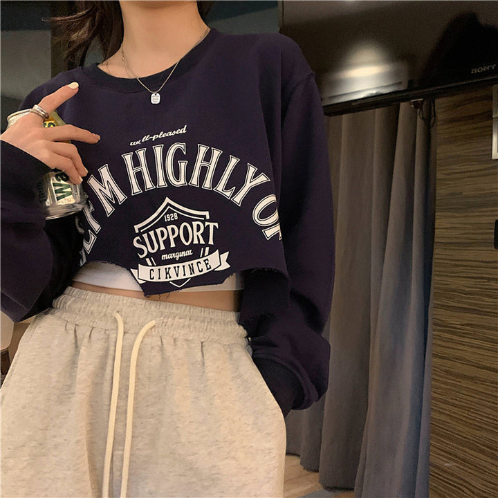 Femme Cropped Graphic Sweatshirt med frynset kant Stilla