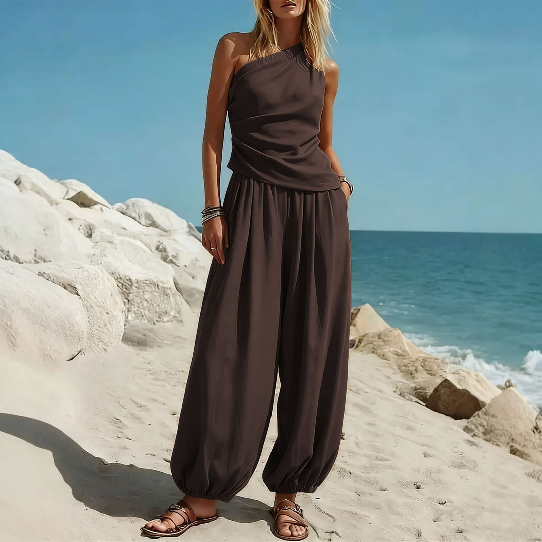 Damer Elegante Én-delt Outfit med Flydende Snit og One-Shoulder Design Skovae