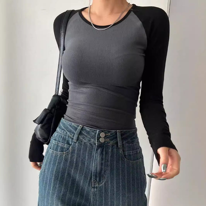 Dame langærmet skjorte i sporty raglan-stil med tætsiddende snit Stilla