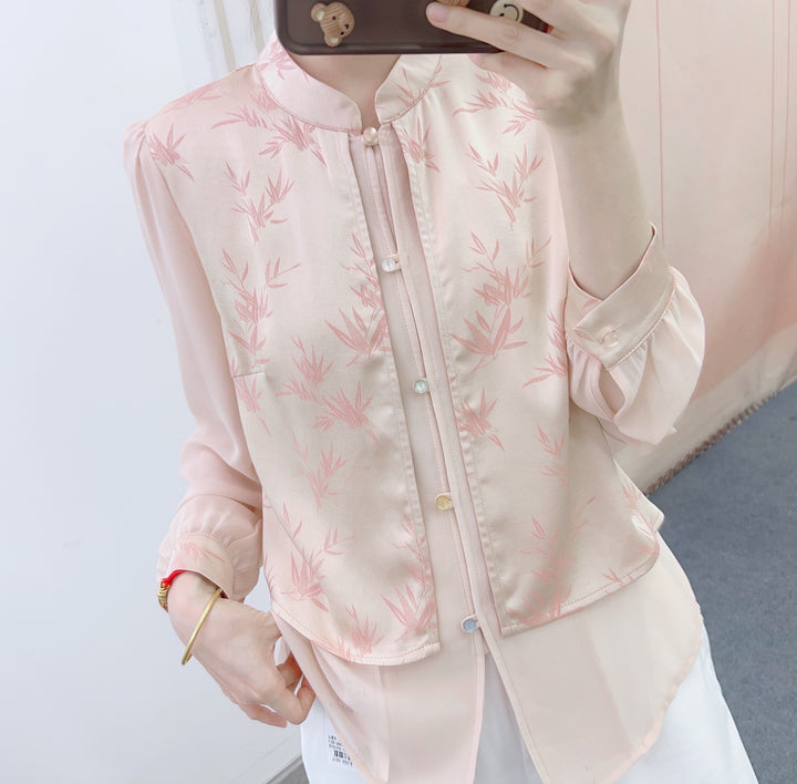 Damebluse med blomsterdesign og elegant krave Stilla