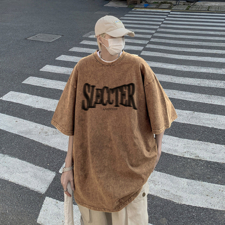 Dame oversized T-shirt med trendy urban grafisk design Stilla