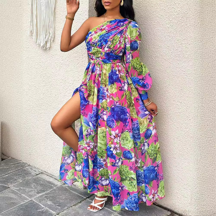 Dame maxikjole med asymmetrisk snit og blomstret design Stilla