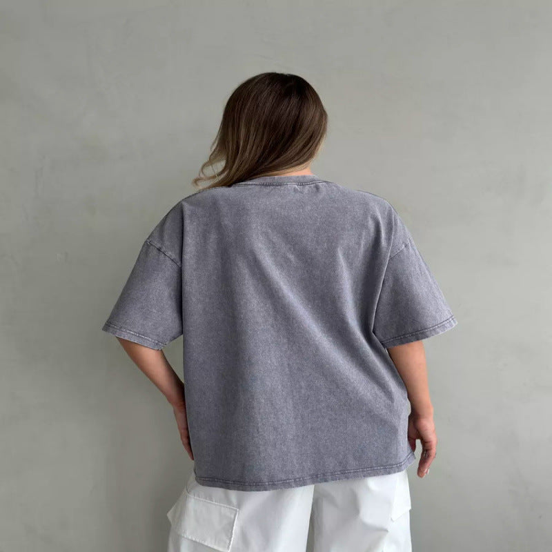 Damer Oversized T-shirt med farverig skrift og florale accenter Stilla