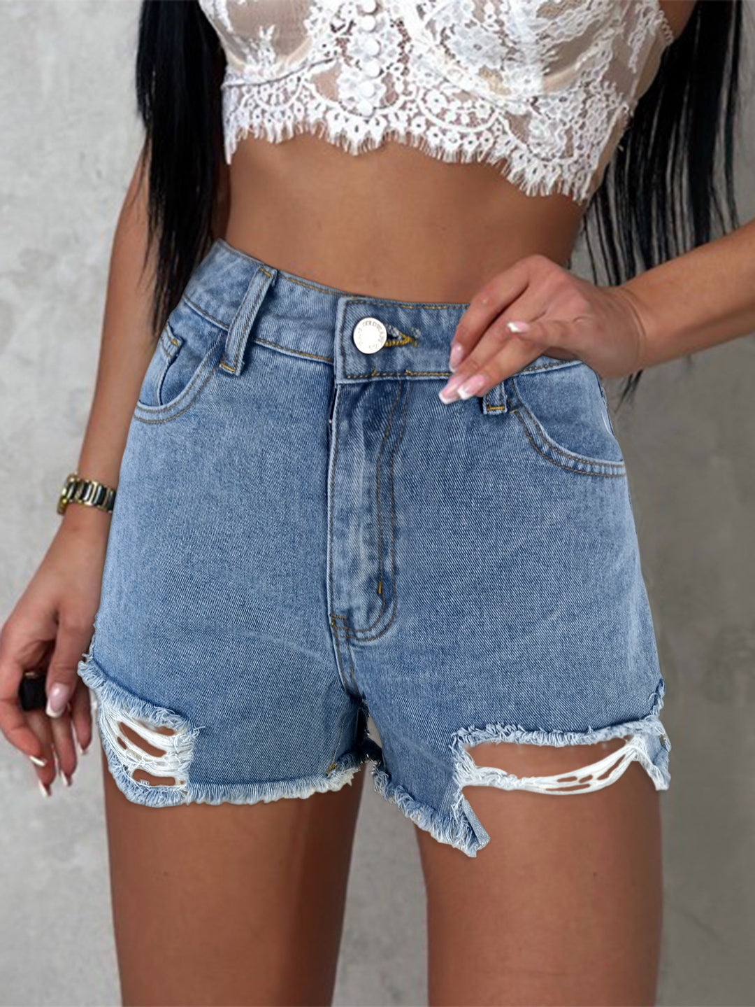 Dame mode Denim-shorts med frynset design og flosset detaljer Stilla
