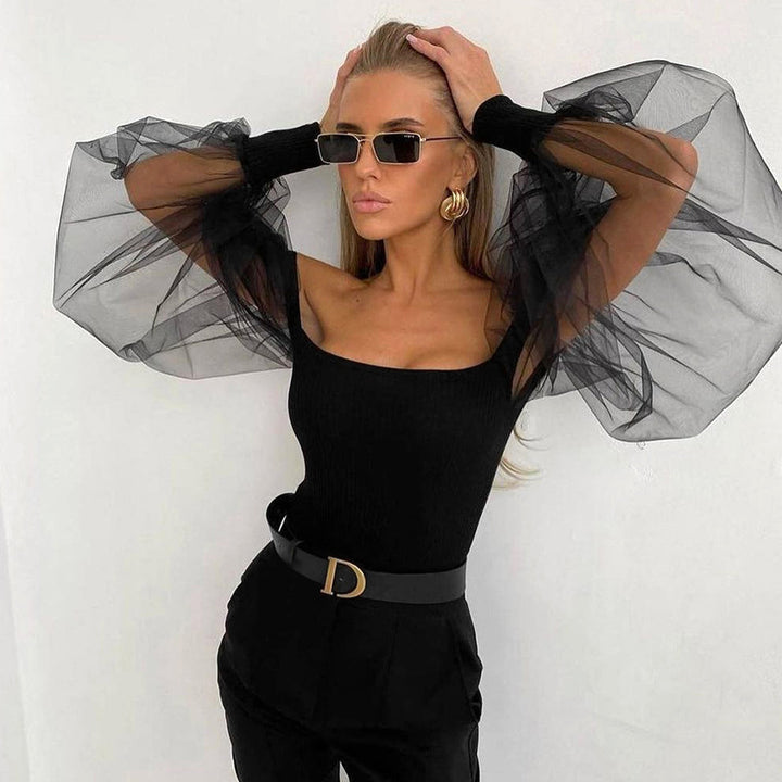 Dame top med transparente pufærmer og figursyet silhuet Stilla