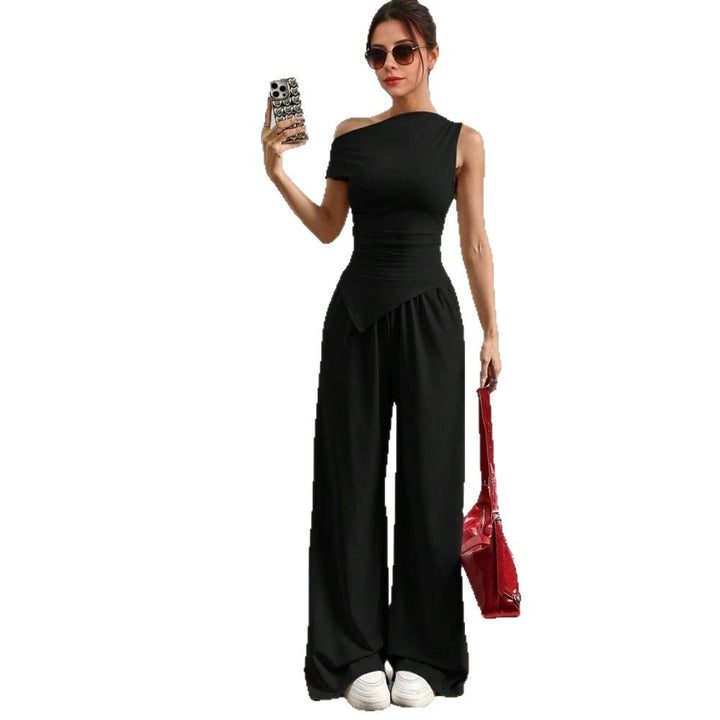 Stilig kvinders jumpsuit med asymmetrisk design og lommer Stilla