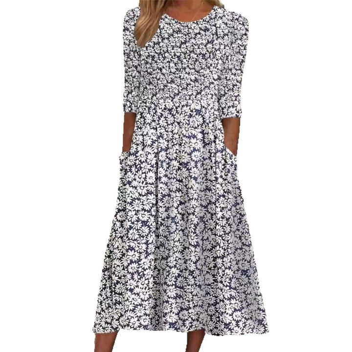 Dame maxikjole med blomsterdesign og praktiske lommer Stilla