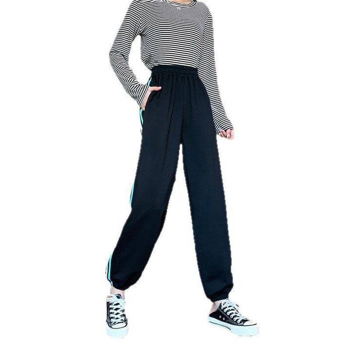 Dame sporty joggingbukser med stilfulde sideindsatser Stilla