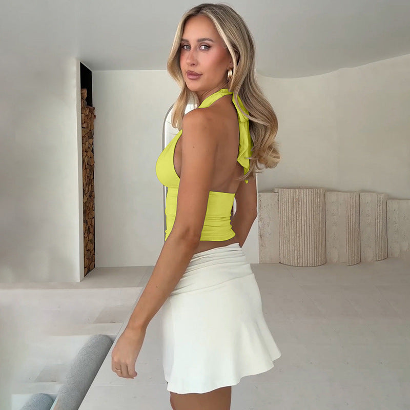 Dame top med raffineret halterneck-design og elegant spænde Skovae