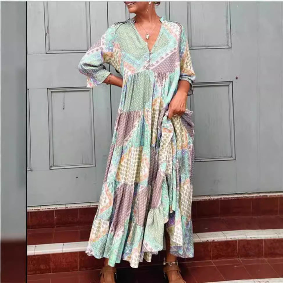 Dame maxidedragt med unikt patchwork-design og sidelommer Stilla