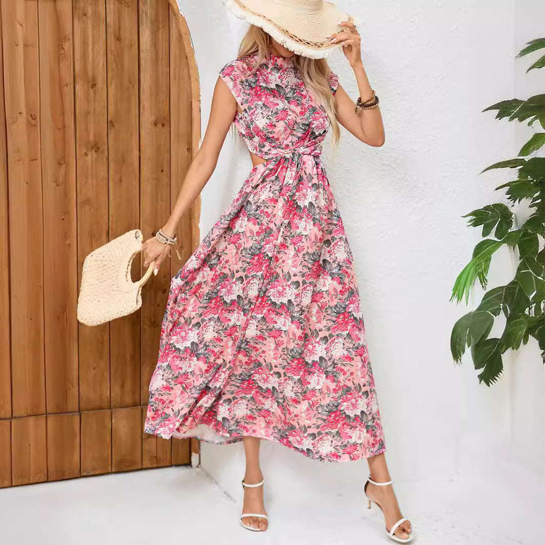 Dame maxikjole med floralt omslagsdesign og asymmetrisk kant Stilla