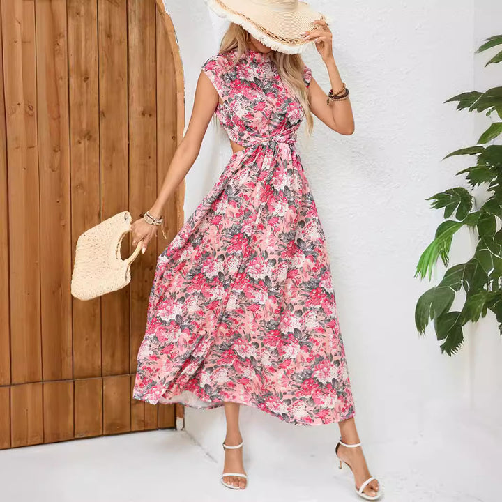 Dame maxikjole med floralt omslagsdesign og asymmetrisk kant Stilla
