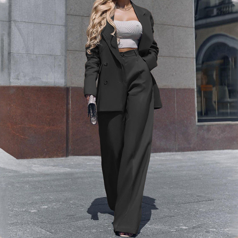 Dame Elegant blazer-outfit med raffineret cut-out-bluse og brede bukser Stilla