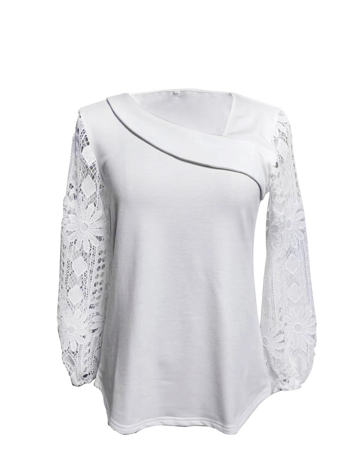 Dame bluse med moderne spidsærmer og elegant V-udskæring Stilla
