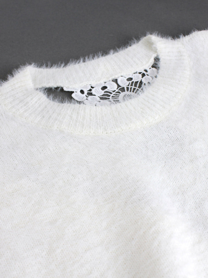 Dame strikpullover med elegant spids rygaccent Stilla