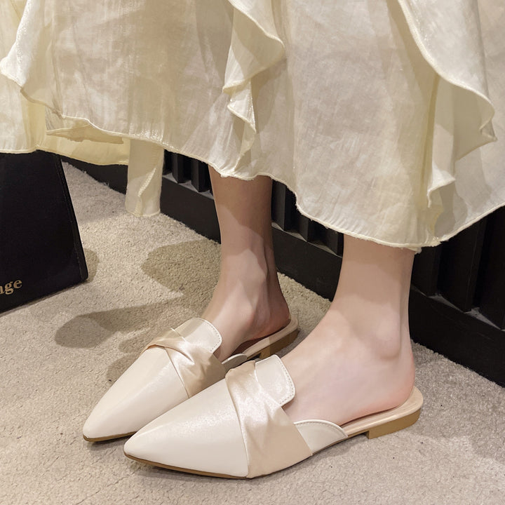 Dame klassiske slippers med smart sløjfeaccent og fint overmateriale Stilla