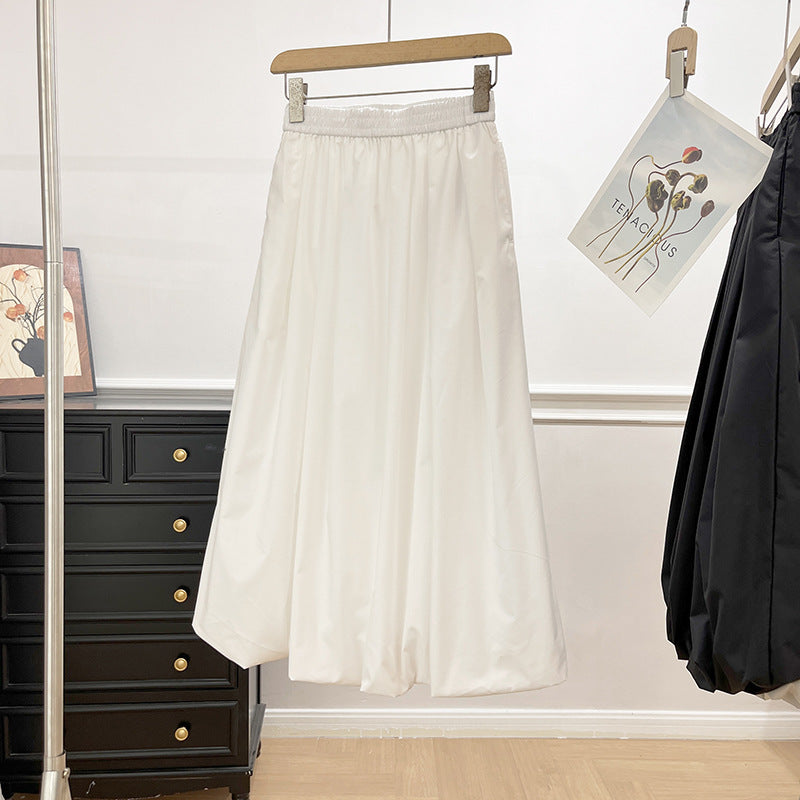 Kvinders elegante midi-nederdel med elastisk talje og voluminøs skæring Stilla