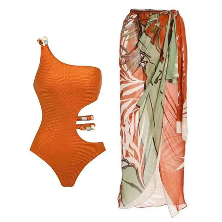 Dame one-piece badedragt med smart cut-out og elegant overkjole Stilla