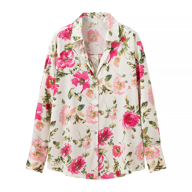 Damebluse med blomsterprint og elegant knapliste Stilla