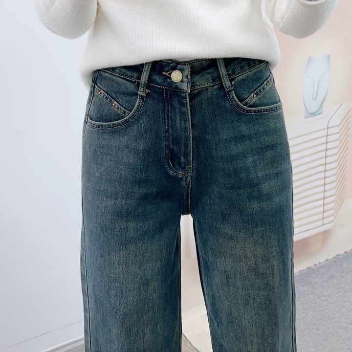 Dame brede high-waist jeans med elegant snit og minimalistiske detaljer Stilla