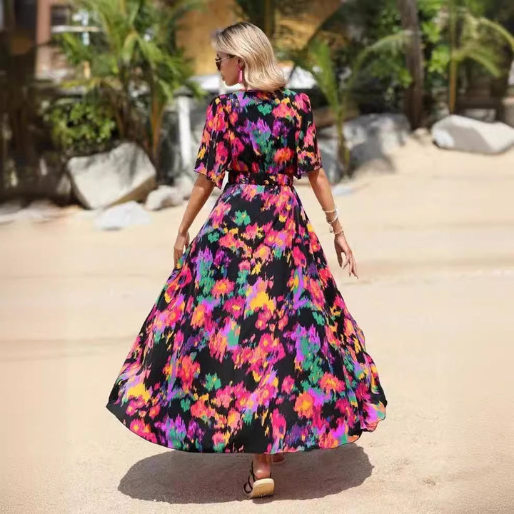 Dame Maxikjole med florale mønstre og elegant båndbinding Stilla