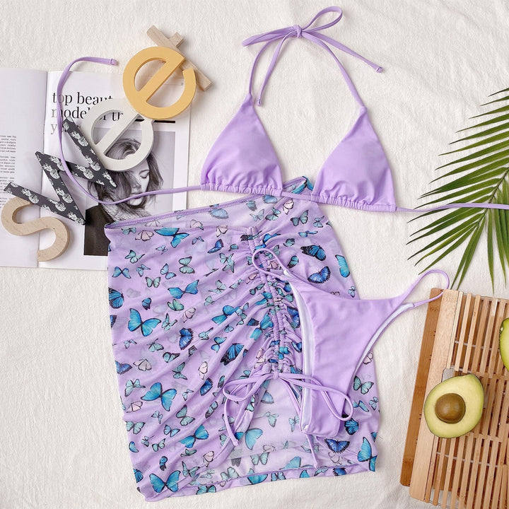 Dame Triangel-Bikini med transparent Wickel-Rock-Optik og farverigt sommerfuglemønster Stilla