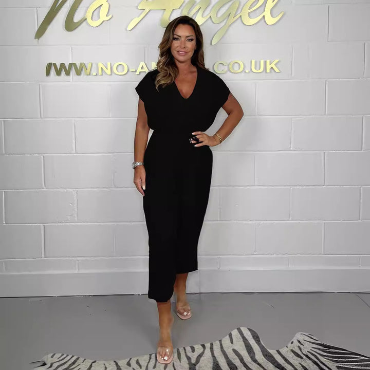 Dame Elegant Jumpsuit med vide ben og stilfuldt omslag design Stilla