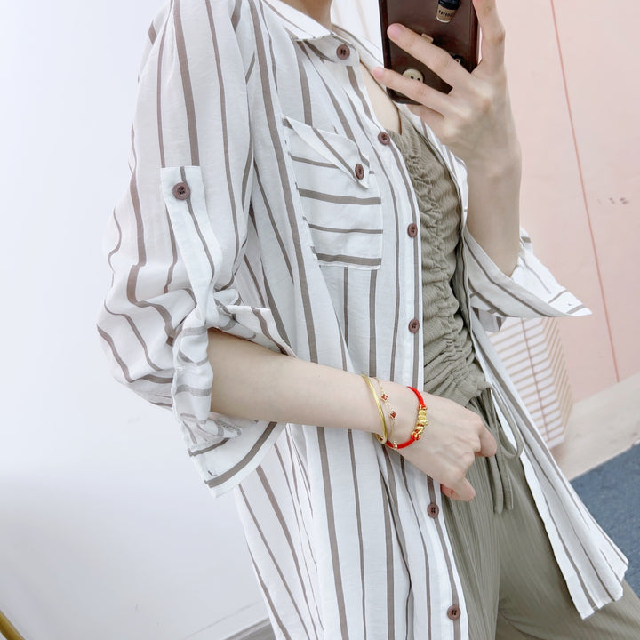 Damer Løst skåret lang bluse med stribet design og linned-blanding Stilla