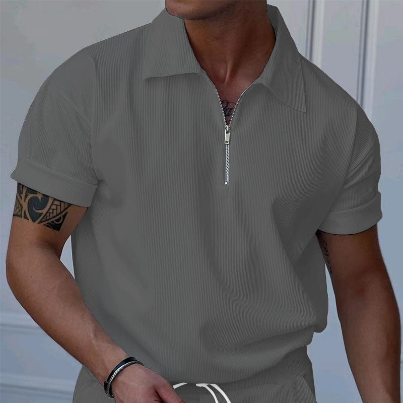Herrer polo med kort lynlås og struktureret design Stilla