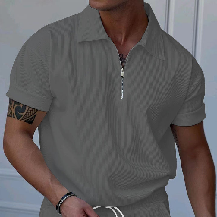Herrer polo med kort lynlås og struktureret design Stilla