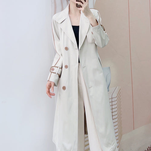 Dame trenchcoat med moderigtige accenter Stilla