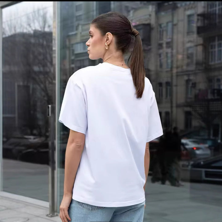 Dame Oversized T-shirt med kreativ tekst og afslappet snit Stilla
