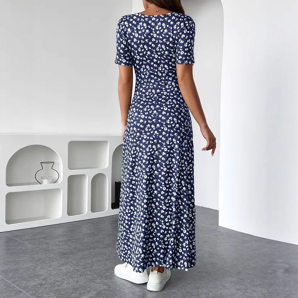 Dame Maxikjole med floral indpakningsdesign og praktiske sidelommer Stilla