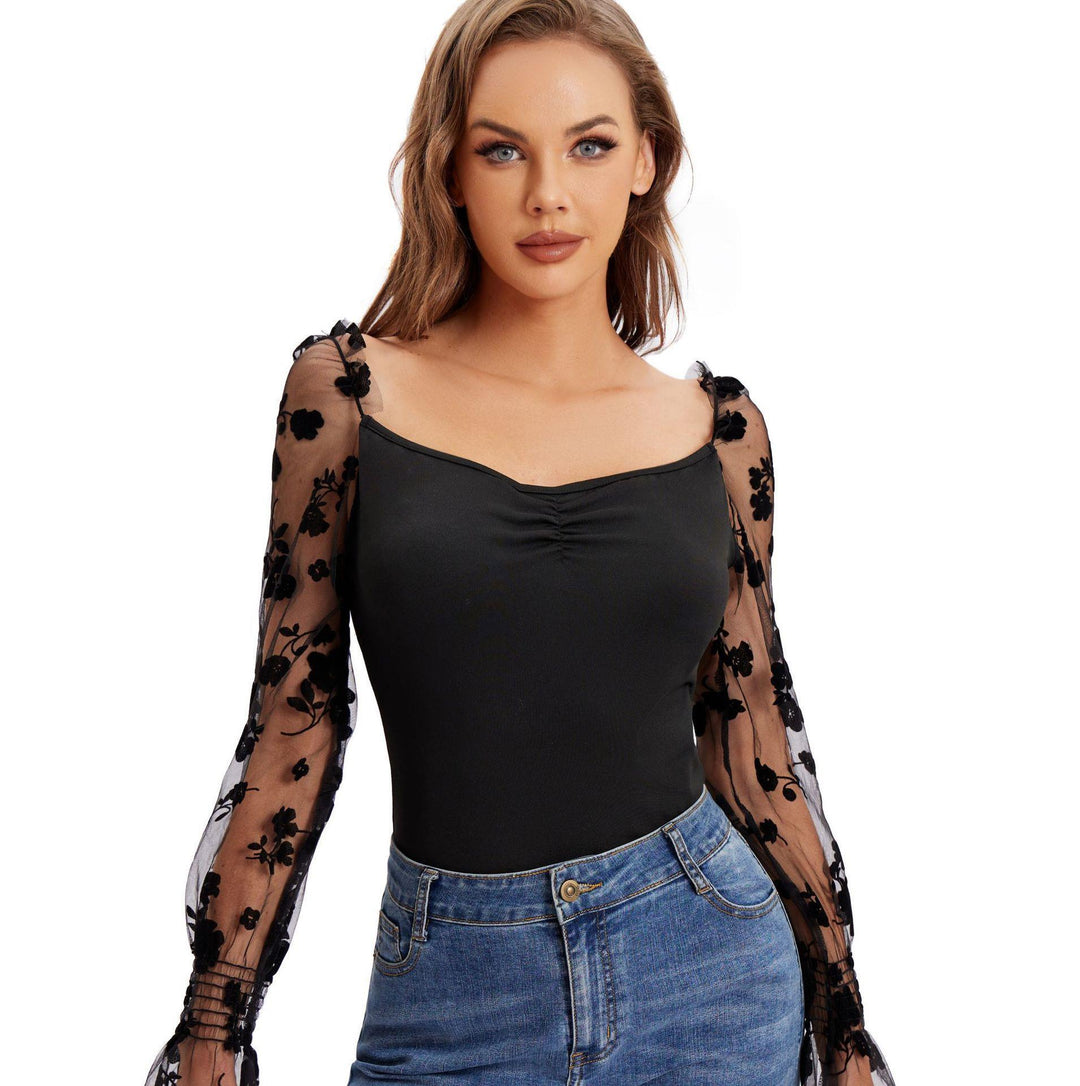 Dame Body med blomsterpuffærmer og elegant design Stilla