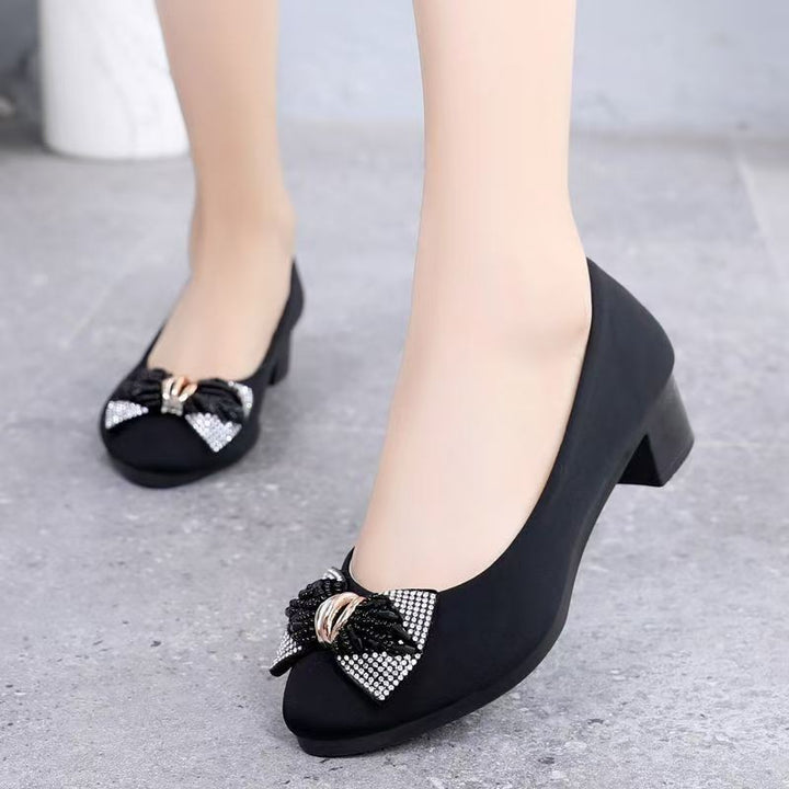 Dame elegante Pumps med glamorøs strassdetalje og eksklusiv sløjfeapplikation Stilla