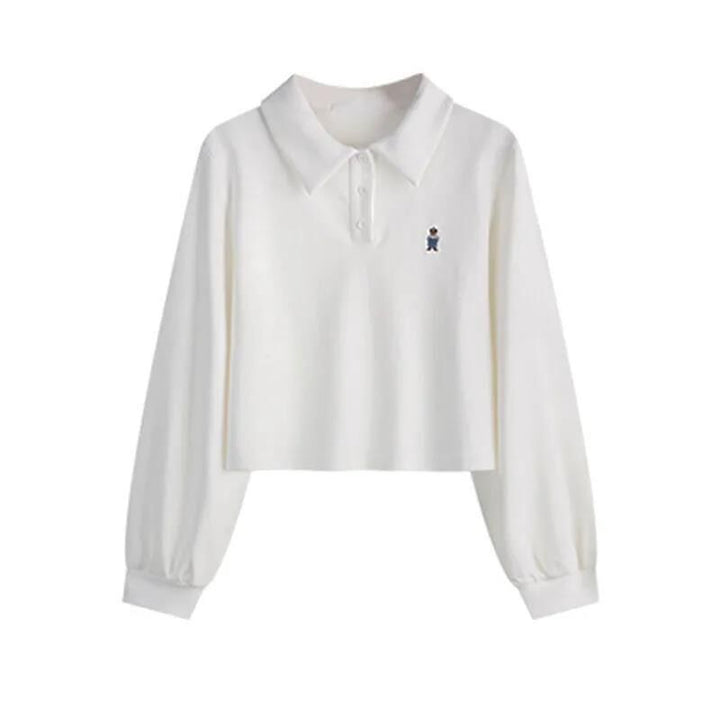 Dame skåret langærmet polo-top med stilfuld broderi Stilla