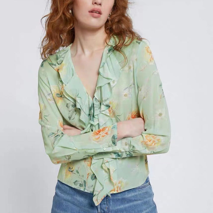Dame ruffles blouse med floral design og elegante detaljer Stilla