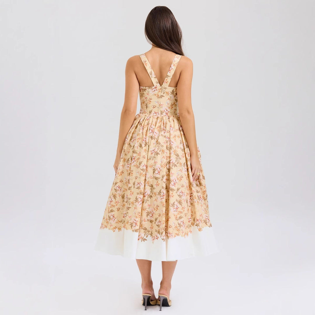 Dame Midikjole i vintage-stil med blomstertryk og svajende skørt Stilla