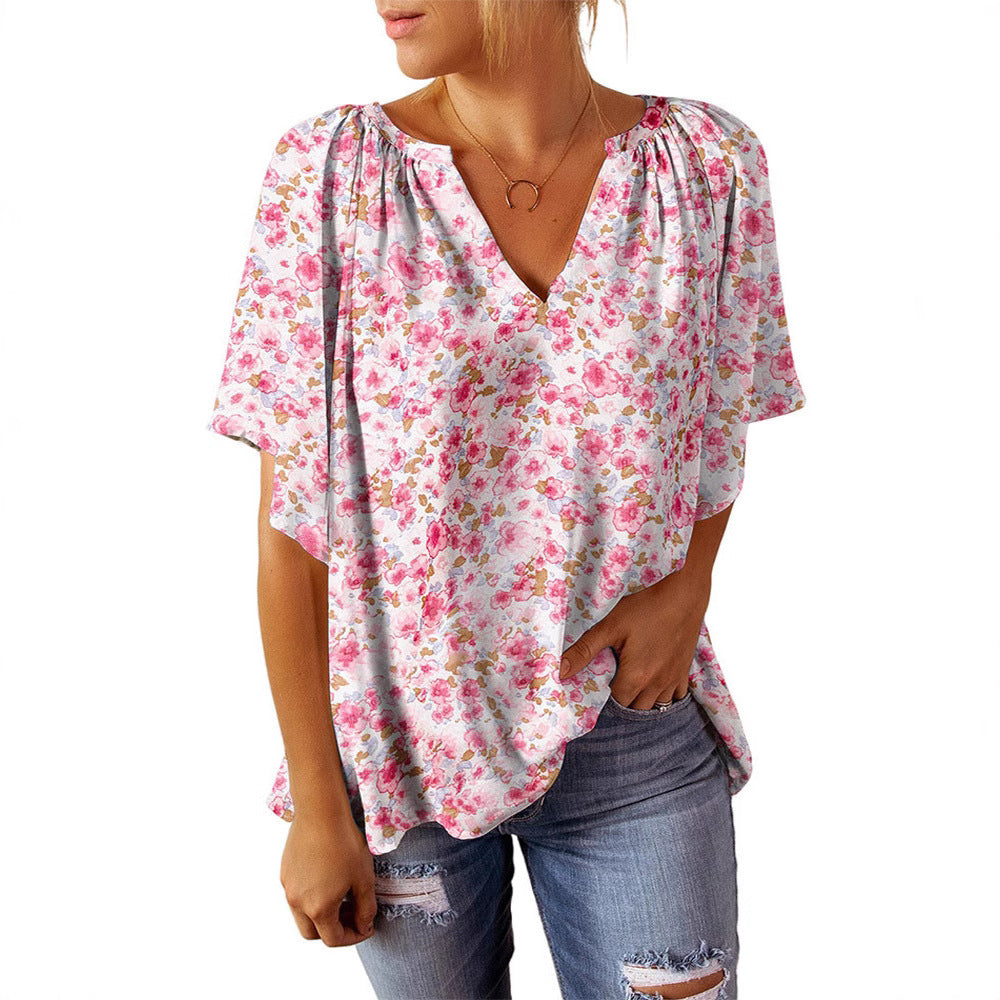 Damebluse med blomstermønster og V-hals Stilla