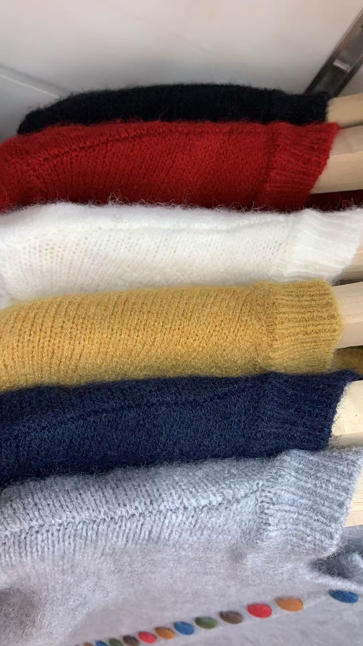 Kvinders cardigan med farverige knapdetaljer og blødt filtmateriale Stilla
