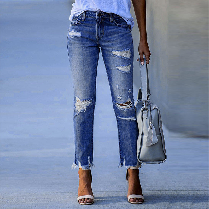 Dame Ripped High-Waist Jeans med frynset kant og modeødelæggede detaljer Stilla