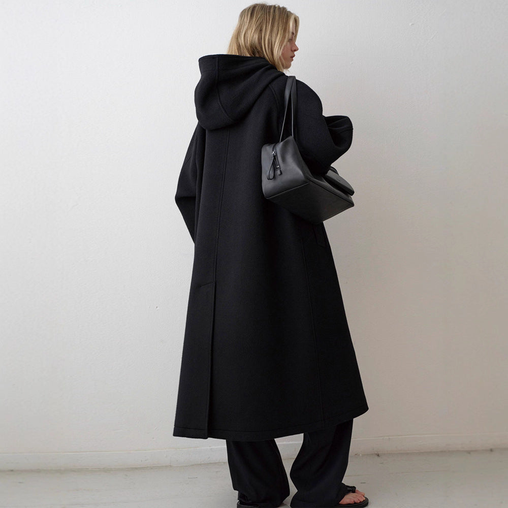 Kvinders elegante oversized jakke med hætte og praktiske lommer Stilla